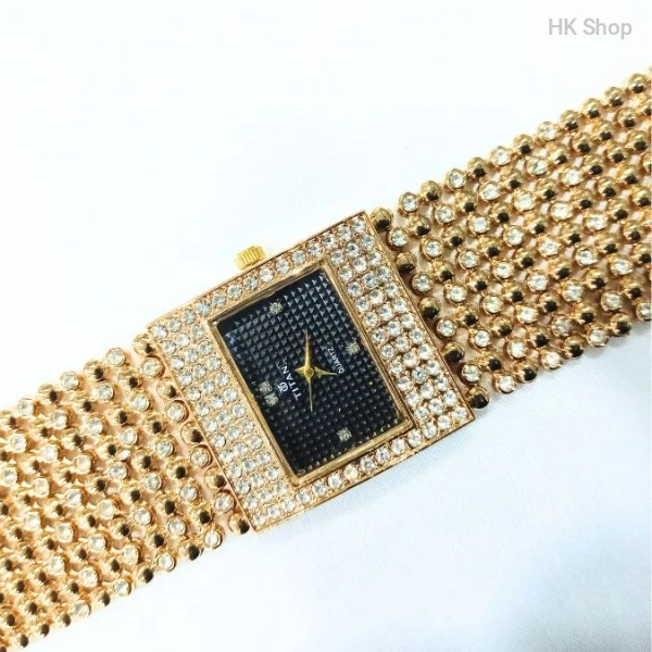 Titan Women's Gold and Silver Luxury Watch – Elegant and Versatile Timepiece 2025-best one
