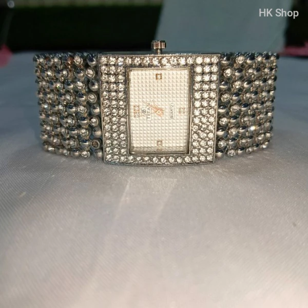Titan Women's Gold and Silver Luxury Watch – Elegant and Timeless Timepiece