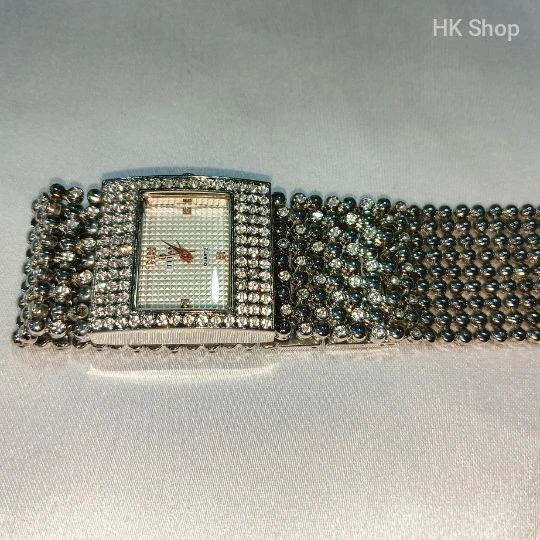 Titan Women's Gold and Silver Luxury Watch – Elegant and Timeless Timepiece