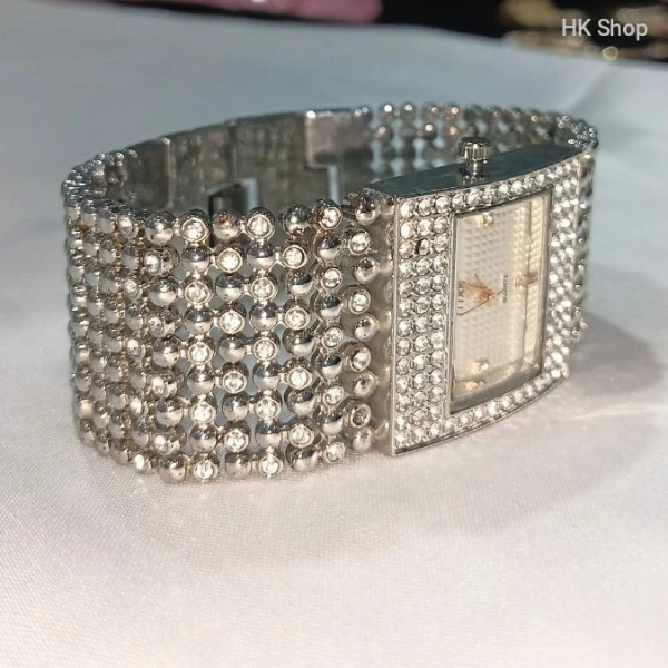 Titan Women's Gold and Silver Luxury Watch – Elegant and Timeless Timepiece