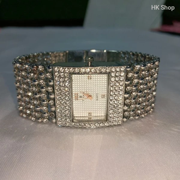 Titan Women's Gold and Silver Luxury Watch – Elegant and Timeless Timepiece