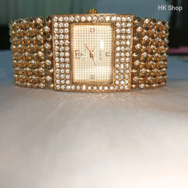 Titan Women's Gold and Silver Luxury Watch – Elegant and Timeless Timepiece
